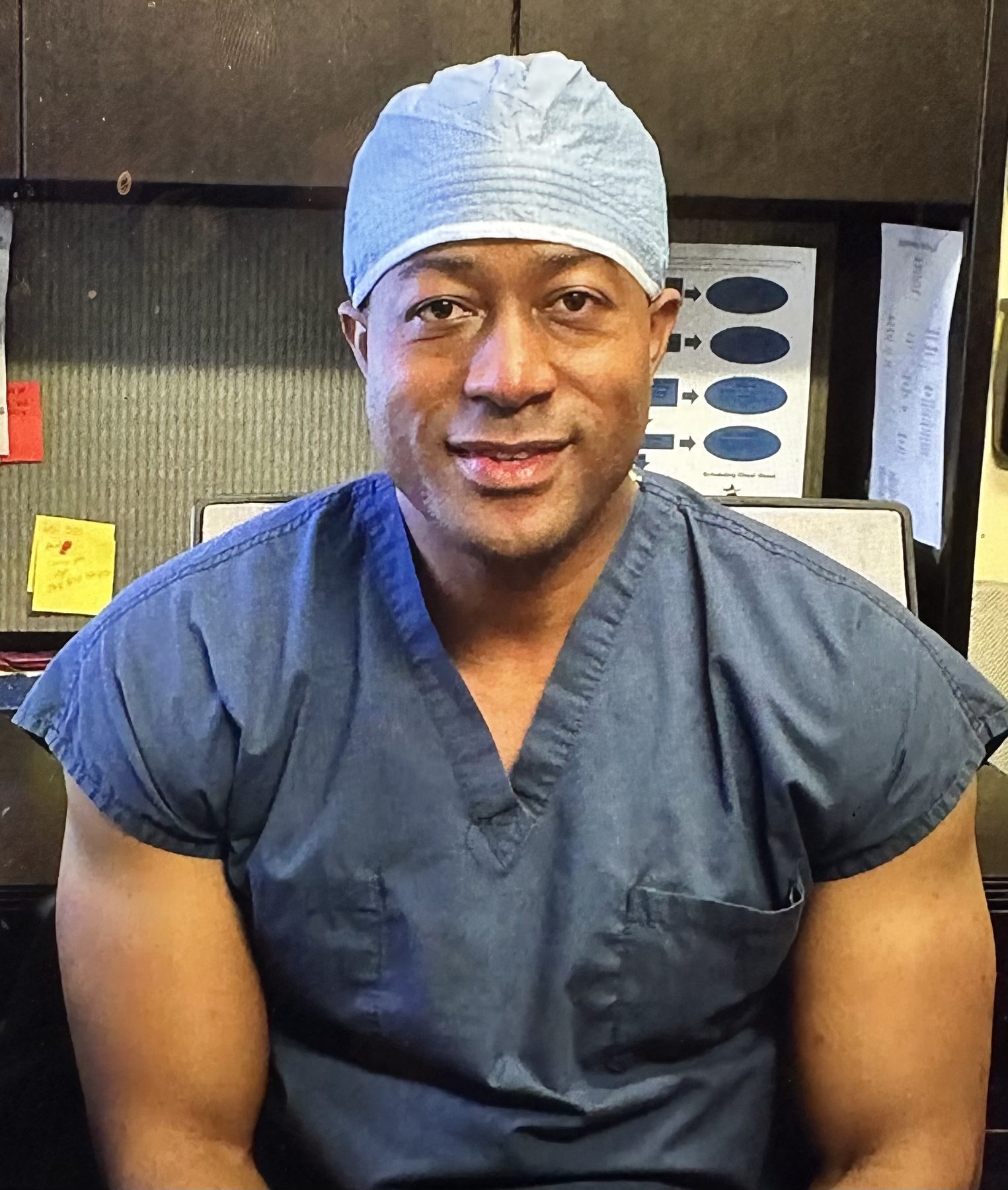 Dr. Keith Johnson in surgical scrubs